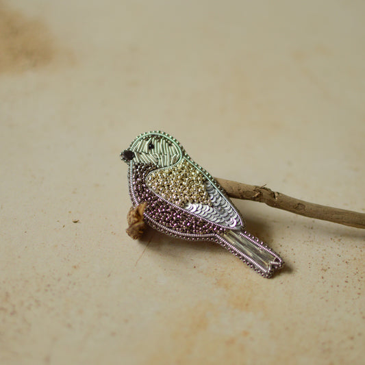 Silver sparrow beaded brooch
