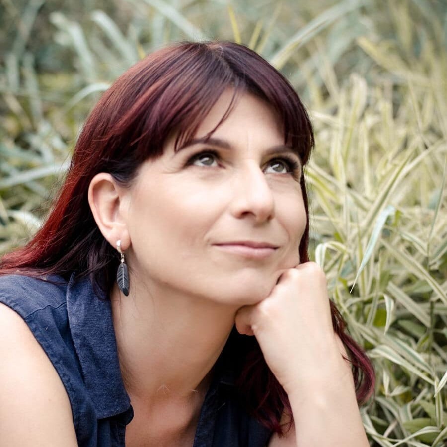 Black Feather Earrings on a model