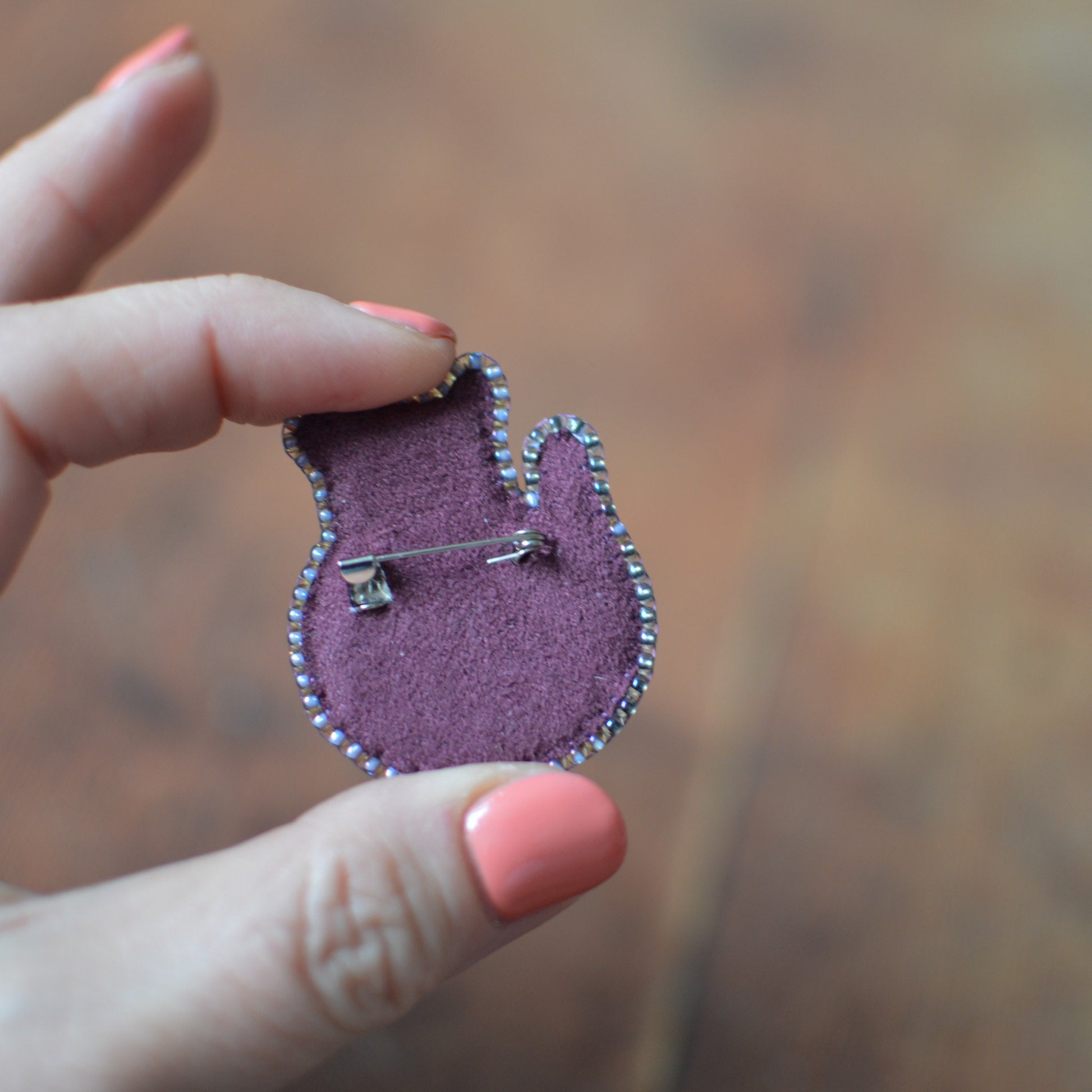 embroidered cat brooch - back