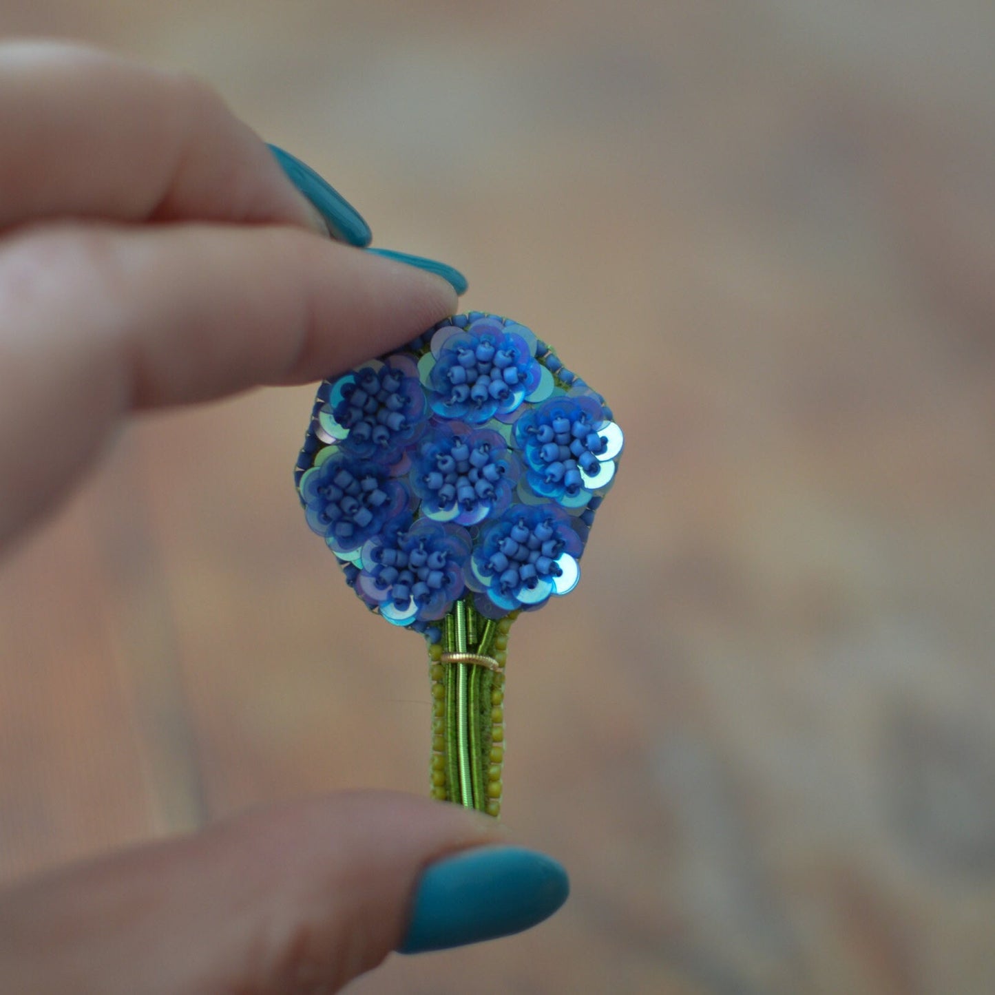 Blue sequin flower bouquet brooch
