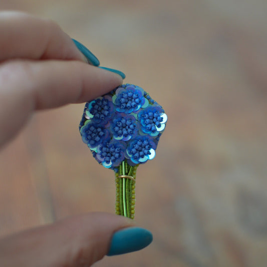 Blue sequin flower bouquet brooch