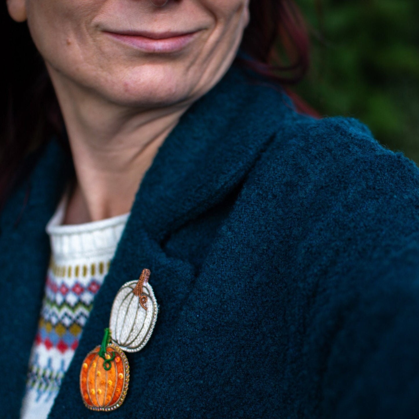 Embroidered Pumpkin Brooches worn on a coatcoa
