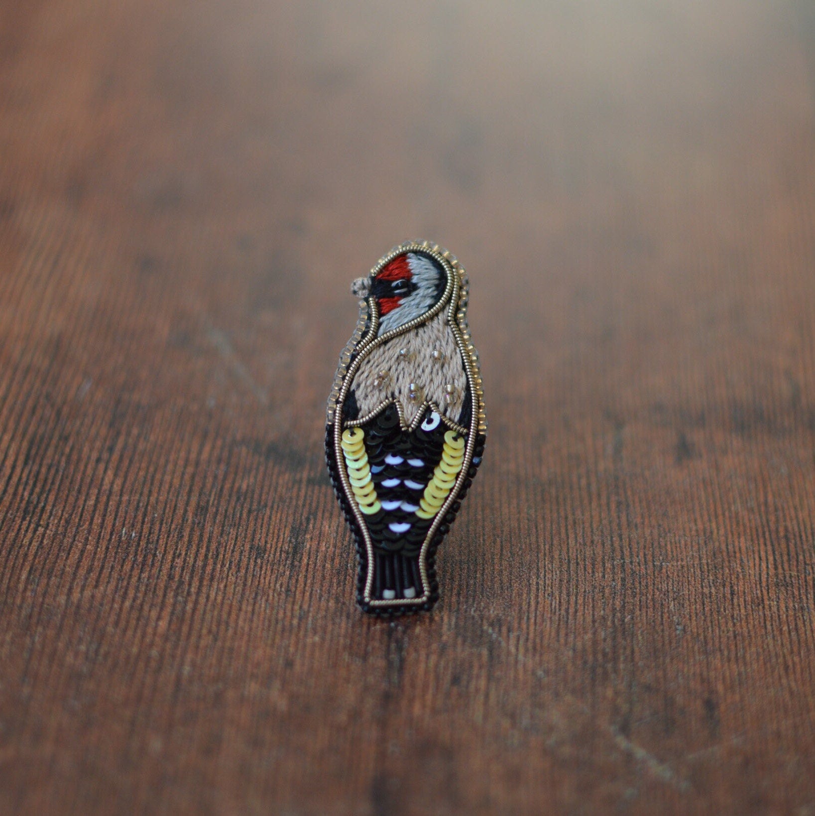 Embroidered goldfinch brooch