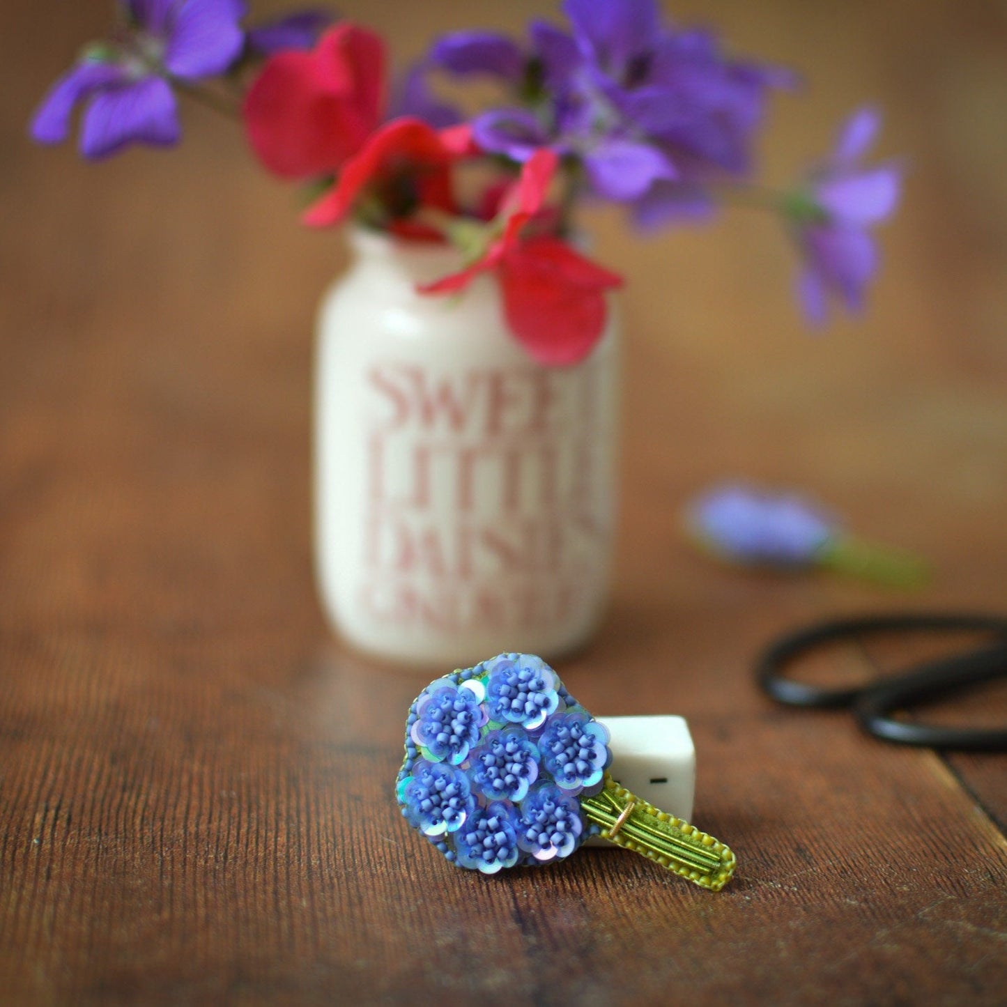 Blue sequin flower bouquet brooch